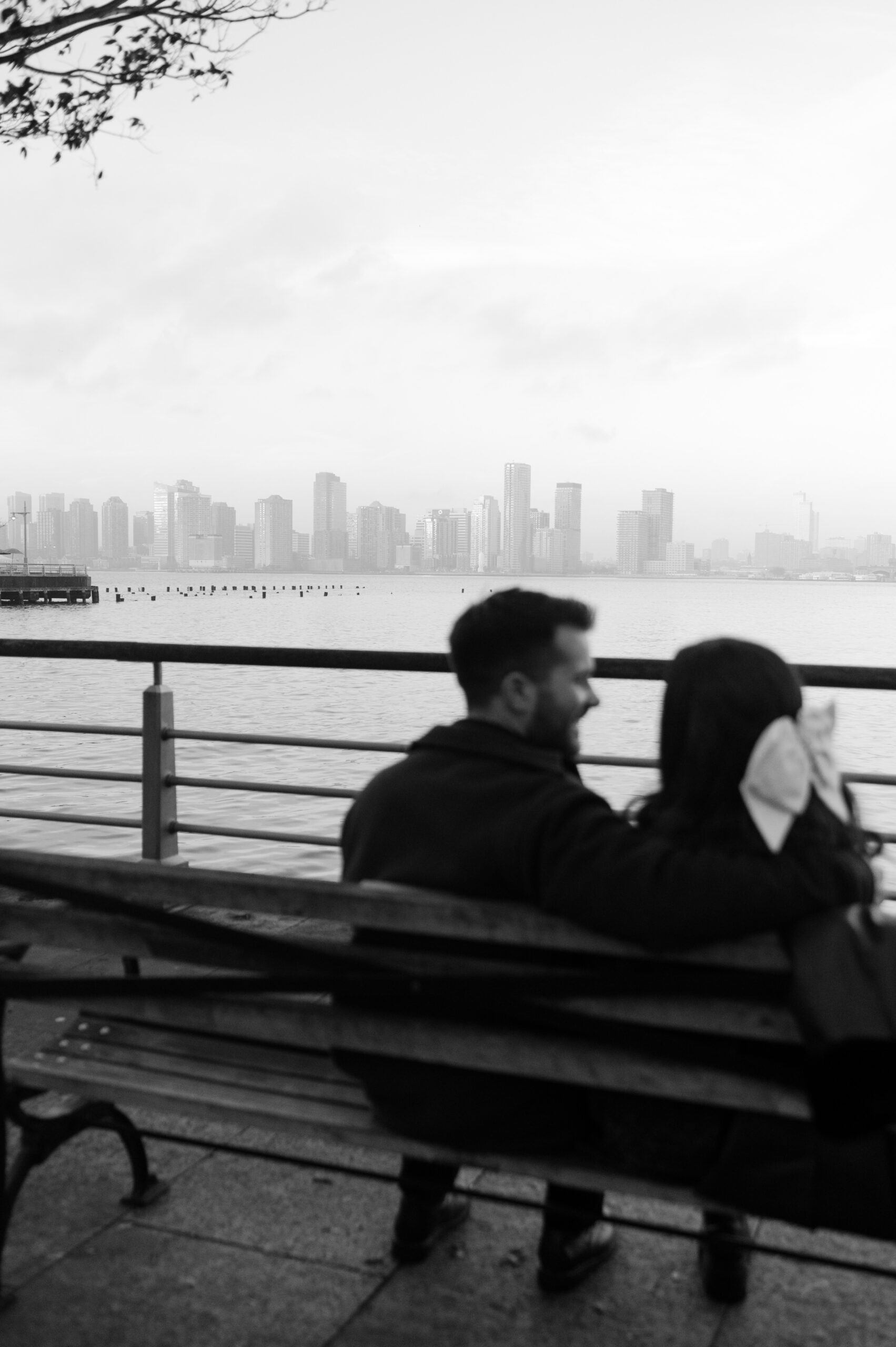 A couple looking at the New Jersey Skyline