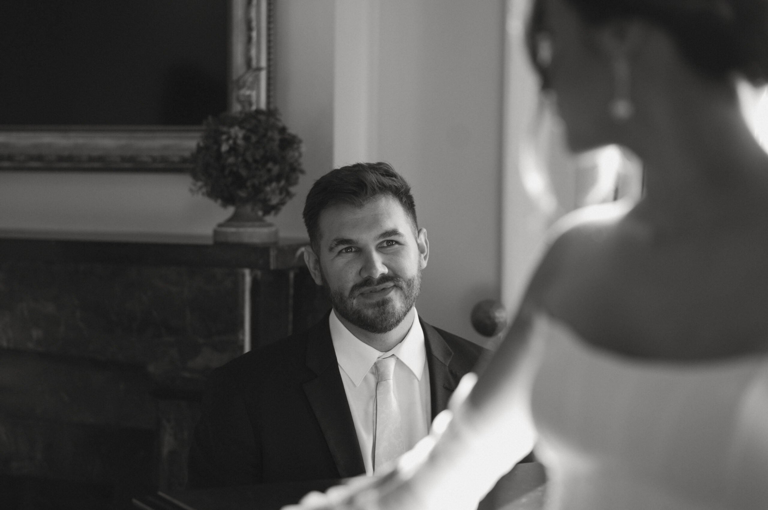 Groom watching his bride during an intimate moment after their NYC courthouse ceremony.